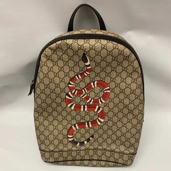 gucci gg supreme sling backpack